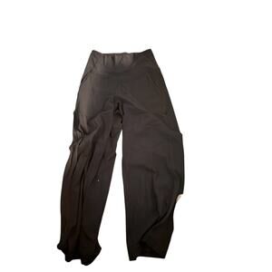 Lululemon Yoga Pants. Black Size 4. Straight leg with small bell bottom.